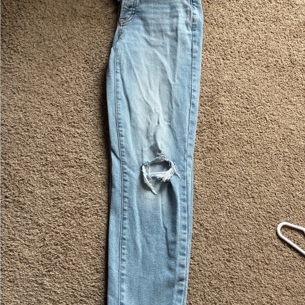 Women's Light Blue Distressed Jeans